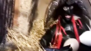 The Encasement Rubber Serf is Dominated by 2 Latex Mistresses in an old Shed - Part two