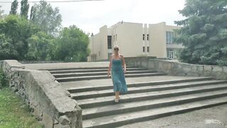 Lukerya walks by the river