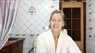 Hawt hostess Lukerya in the kitchen in a dressing gown.