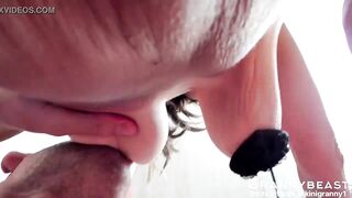 Old lady breastfeeding large natural breasts