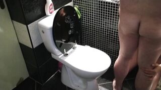 Wife sucks wang whilst I pee on the throne-room