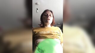 Playing with a balloon and bursting it against my tits