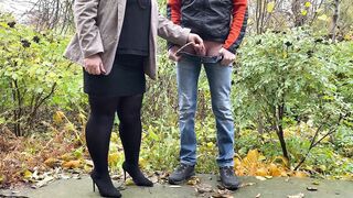 Sexy mother i'd like to fuck in hose and petticoat holding man's penis outdoors whilst pissing