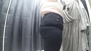 In a fitting room in a public store, the camera caught a chunky mother i'd like to fuck with a glamorous butt in transparent pants. PAWG.