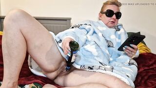 I shove the neck of the bottle into the cervix and fondle my love button