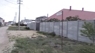 Nylon business lady below leather raincoat