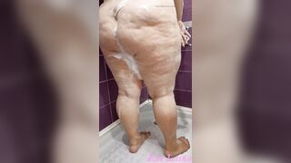 Stepmom with large tits and large ass takes a shower in advance of s