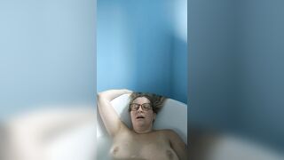 Masturbating in the washroom tub and cumming
