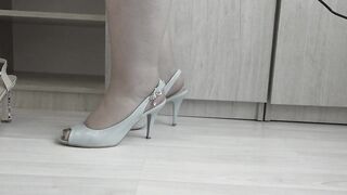 I put on nylon tights and try on high-heeled shoes.