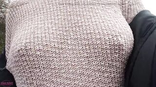 Boobwalk: Walking braless in a pink watch throughout knitted sweater