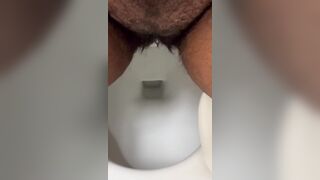 Curly Bitch Goddess P Peeing complication whilst at work