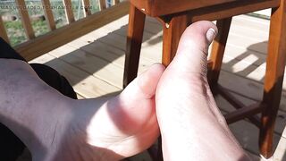 Playing footsie on the back porch with our pedicured toes