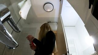 Large Bazookas Large Booty Sexy Golden-haired Playgirl in Hose and High Heels with a Miniskirt does a Striptease in t