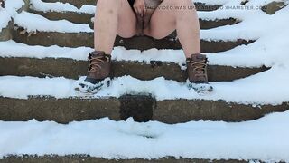 peeing on some stairs in the snow
