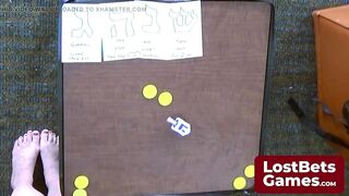 Chelstein and Dee Williams in a game of Undress Dreidel