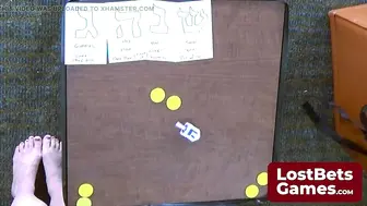 Chelstein and Dee Williams in a game of Undress Dreidel