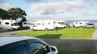 Trashy mother I'd like to fuck floozy piddles on the grass in front of other campers at the beach