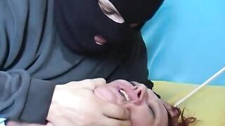 Masked guy ties up and screws the excited redhead German wench