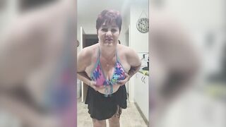 Kiwi Bitch plays with her tits to hawt porn music