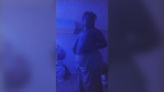 Titty dancing in the blue light