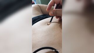 S&m outfit with a feather tickle