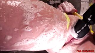 Red XXX gets all soaped up in the shower