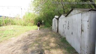 A mother I'd like to fuck pees outdoors behind public garages. Amateur fetish with a strong stream of urine.