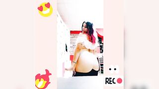 Loly jiggling her butt for a tease previous to changing at work alone