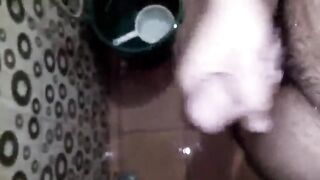 Concupiscent Youthful Chap Having Pleasure Jerking Off His Giant Weenie in the Water closet