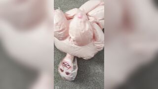 Inflating a granny blow up doll