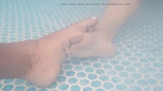 Underneath water feet