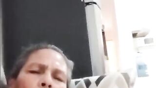 Granny with toy in her butt